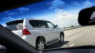 Image: A SUV travels on a highway in Sunrise, Fla., in 2010.