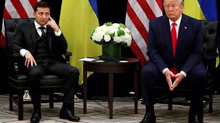 Image: Ukraine's President Volodymyr Zelenskiy listens during a bilateral m