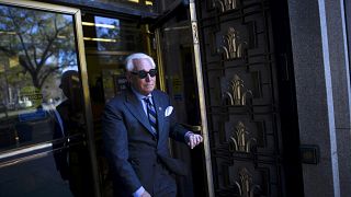 Image: Roger Stone leaves court during a lunch break in his trial in Washin