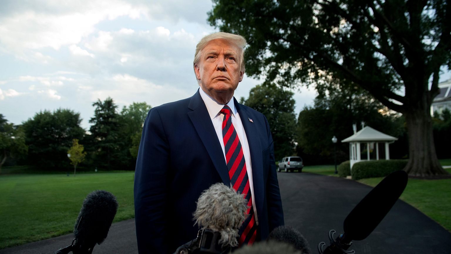 Image: President Donald Trump speaks to the press outside of the White Hous