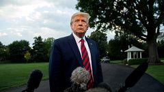 Image: President Donald Trump speaks to the press outside of the White Hous