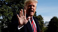 Image: President Donald Trump speaks to the media on the South Lawn of the 