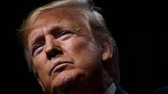 Image: President Donald Trump pauses while speaking at the Economic Club of