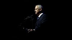 Image: Benny Gantz, head of Blue and White party, speaks during a rally com
