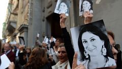Image: People leave the church of St Francis, after the Archbishop of Malta