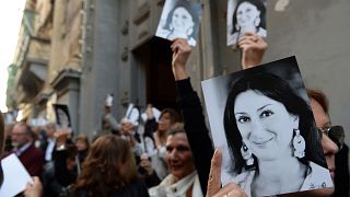 Image: People leave the church of St Francis, after the Archbishop of Malta