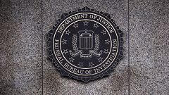 Image: The Federal Bureau of Investigation seal is displayed outside FBI he