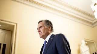 Image: Sen. Mitt Romney, R-Utah, leaves the State of the Union address on F