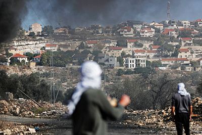 Palestinians protest the Jewish settlements in Kofr Qadom in the Israeli-occupied West Bank on Nov. 22, 2019.