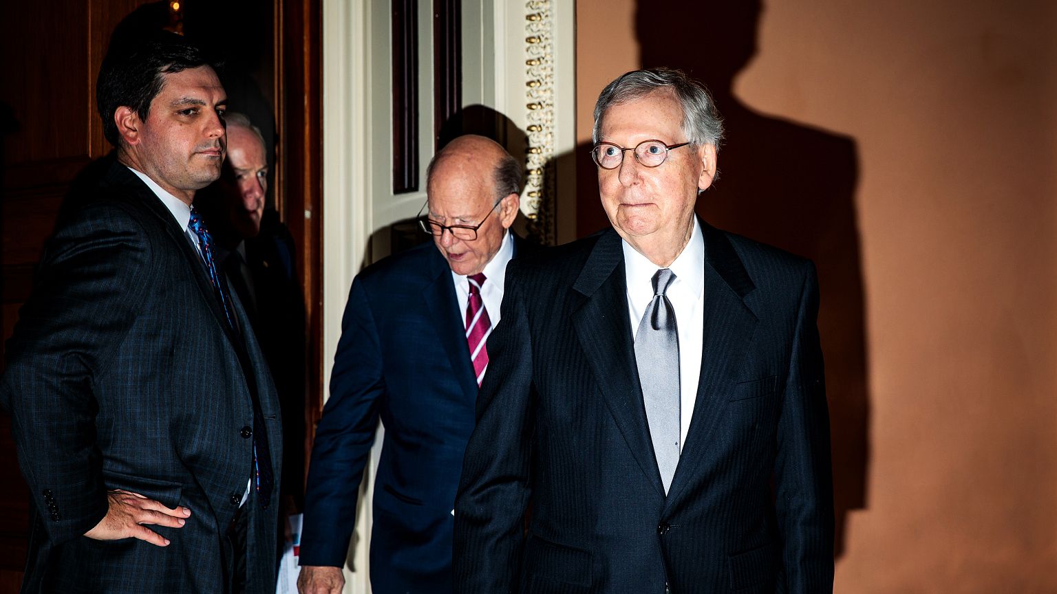 Image: Senate Majority Leader Mitch McConnell leaves a Republican policy lu