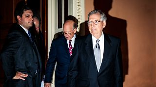 Image: Senate Majority Leader Mitch McConnell leaves a Republican policy lu