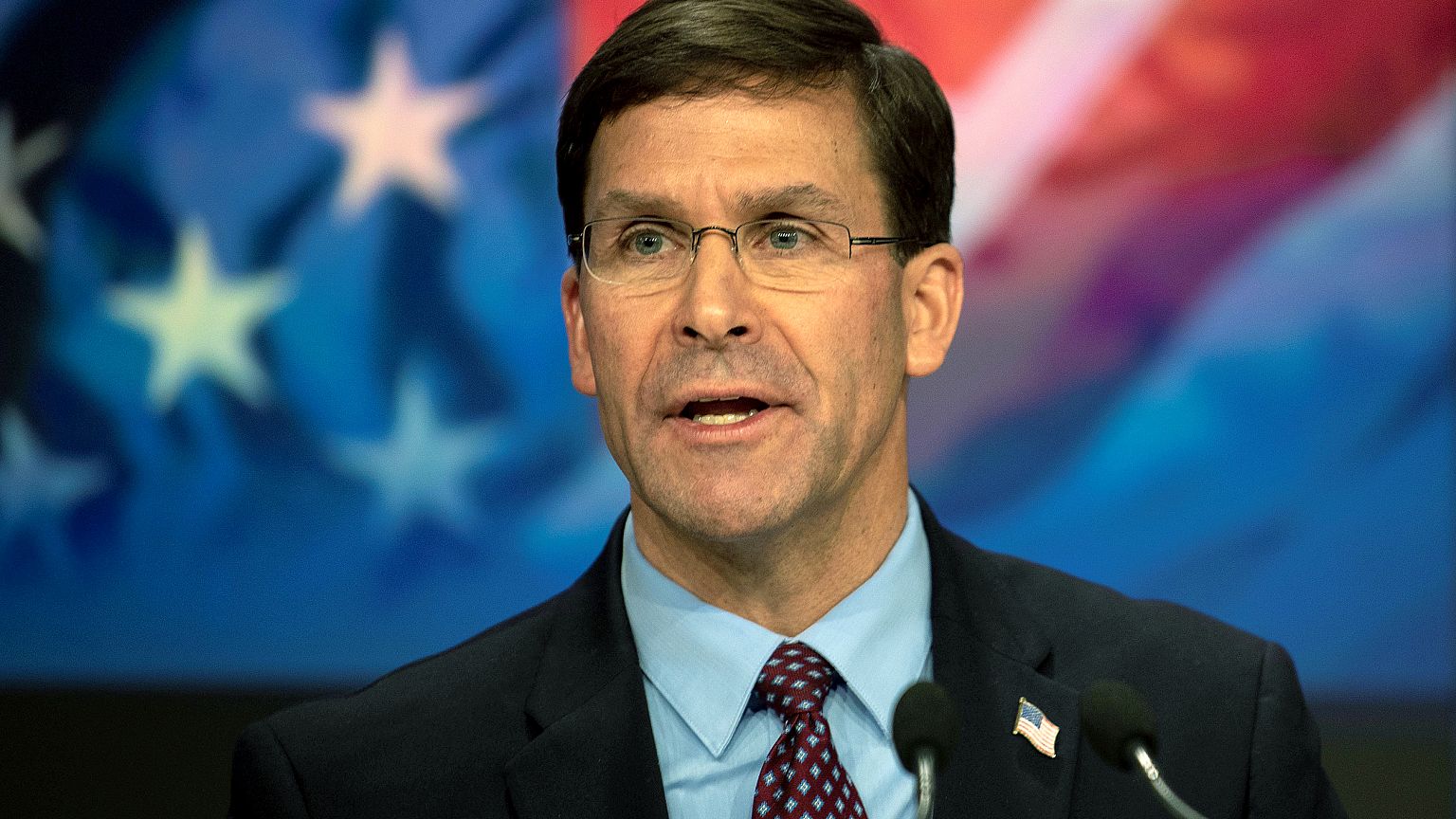 Image: U.S. Defense Secretary Mark T. Esper delivers remarks before ringing
