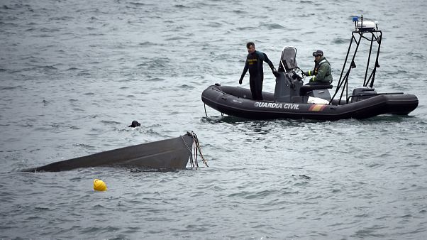 Image: The prow of a submarine used to transport drugs illegally emerges as Image: The prow of a submarine used to transport drugs illegally emerges as
