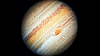 Image: The Great Red Spot, a giant storm, is large enough to swallow earth.