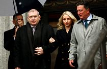 Image: Ukrainian-American businessman Lev Parnas and his wife, Svetlana, le