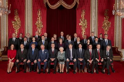 NATO leaders and the alliance\'s secretary general, Jens Stoltenberg, join Queen Elizabeth II and Prince Charles for a group photo at Buckingham Palace on Tuesday.