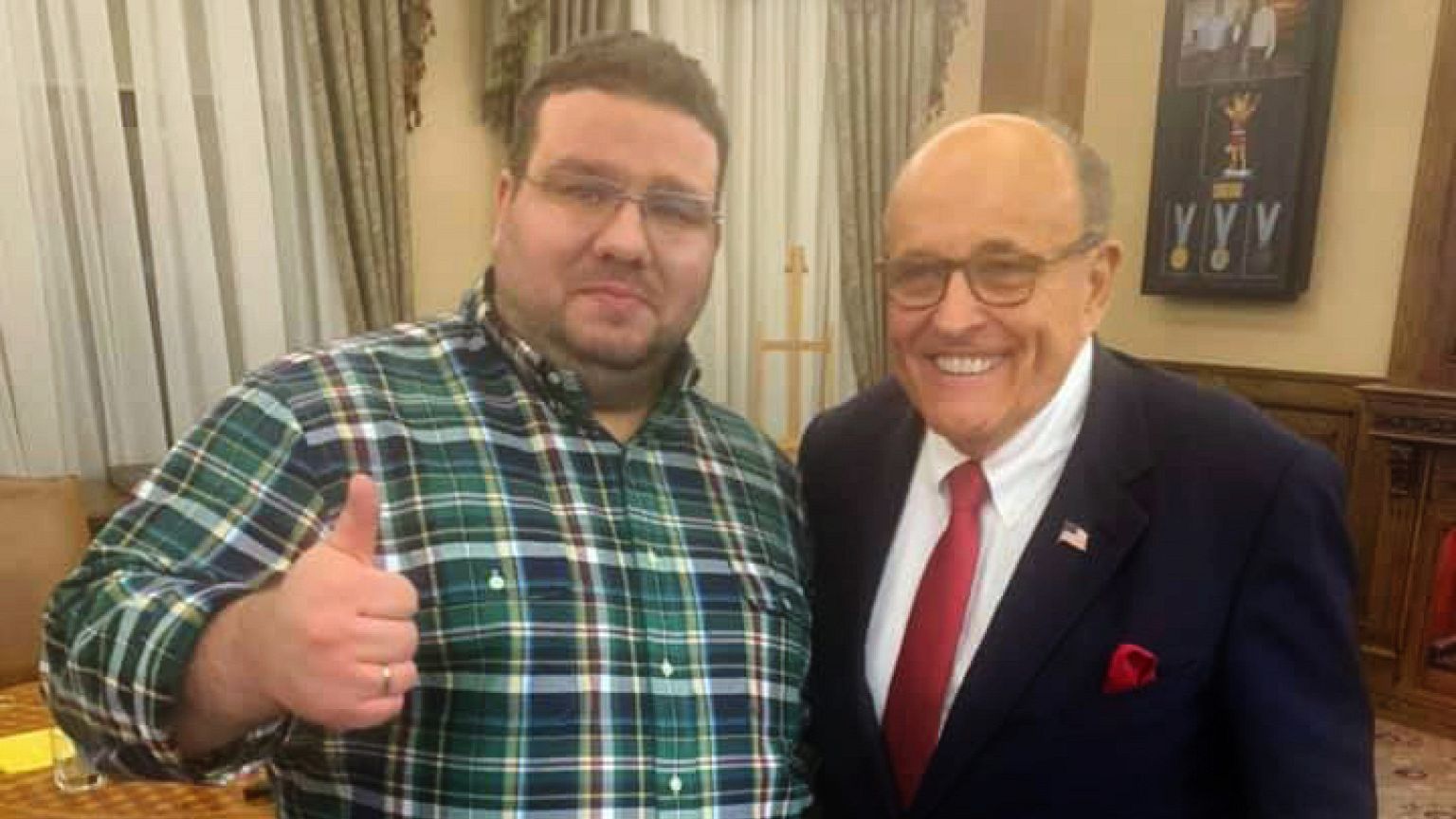 Ukrainian former diplomat Andrii Telizhenko and Rudolph Giuliani pose for a