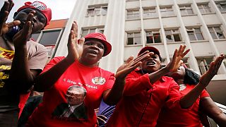 Morgan Tsvangirai's body arrives in Zimbabwe to a rapturous welcome