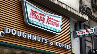 Image: Krispy Kreme store and brand logo seen in London, UK
