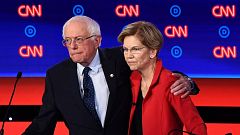 Image: Bernie Sanders and Elizabeth Warren hug after participating in the s