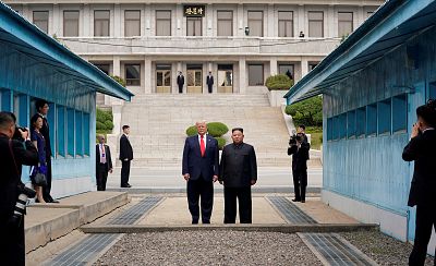 Trump and Kim stand at the demarcation line in the demilitarized zone separating the two Koreas in June 2019.