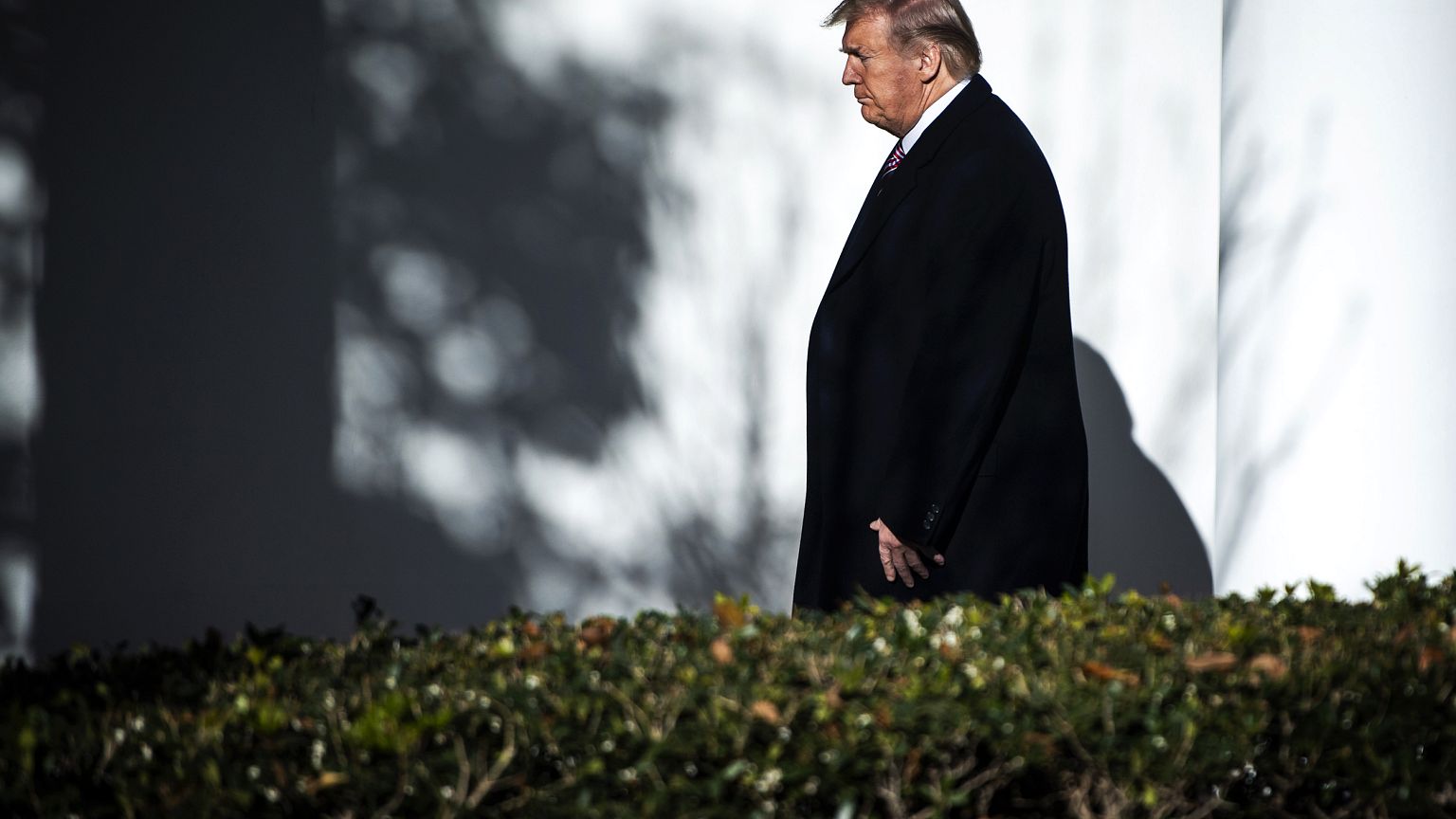 Image: President Donald Trump walks to the Oval Office on Nov. 25, 2019.
