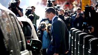 Image: Michael Flynn leaves federal court following his plea hearing