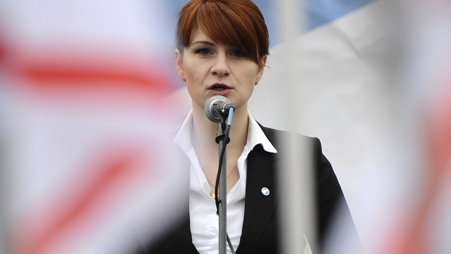 Image: Mariia Butina speaks to a crowd in Moscow in 2013