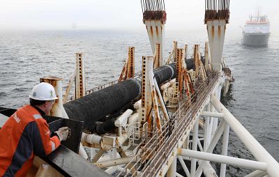 In this file photo taken on November 15, 2018 an employee of the Allseas offshore service company works on the ship "Audacia", from where parts of the Nord Stream 2 pipeline are laid in the Baltic Sea off the coast of Laage, northeastern Germany.