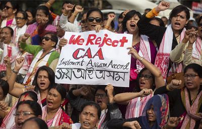 Indian women shout slogans during a protest against the Citizenship Amendment Act in Gauhati, India, on Saturday. 