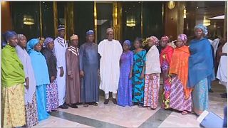 Buhari meets 3 lecturers and 10 police officers freed by Boko Haram