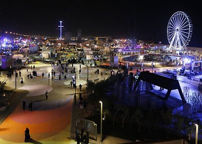 People spend the evening at the Diriyah Oasis amusement park on the outskirts of Riyadh, Saudi Arabia on Dec. 13.