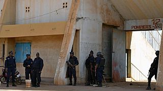 Al Qaeda affiliate claims B. Faso attacks, PM tours army HQ and French embassy