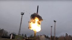 Image: An intercontinental ballistic missile lifts off from a truck-mounted