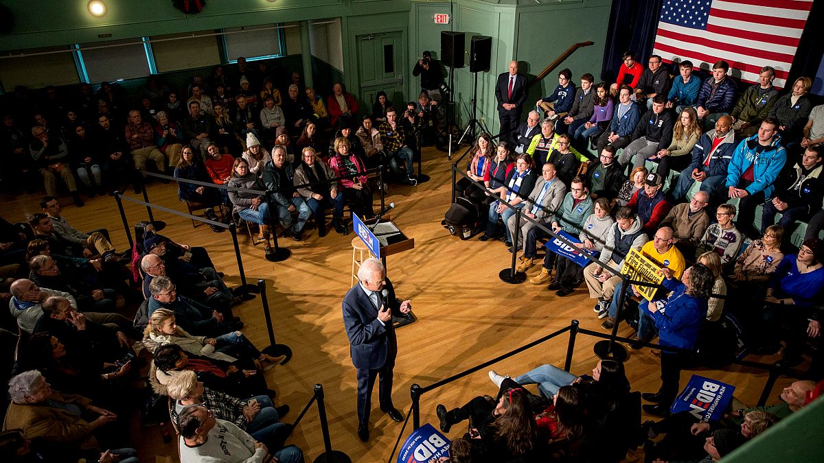 Image: Joe Biden speaks during a campaign town hall in Exeter, N.H., on Dec