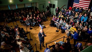 Image: Joe Biden speaks during a campaign town hall in Exeter, N.H., on Dec