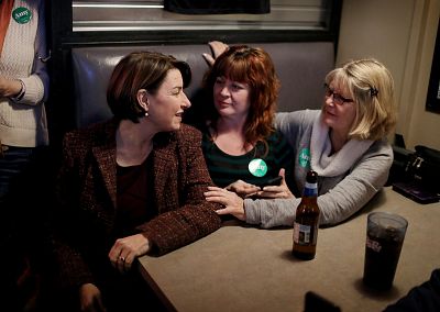 Michelle and Marilyn Simpson speak with Klobuchar at a campaign stop in Algona on Dec. 27, 2019. Klobuchar just finished campaigning in all of Iowa’s 99 counties. 