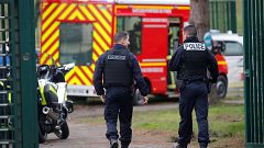 Image: French police secure an area after a knife attack in a public park i