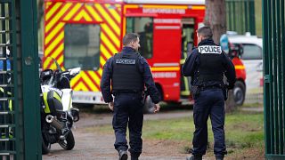 Image: French police secure an area after a knife attack in a public park i