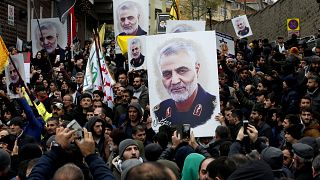 Image: Protesters gather at a demonstration against the killing of Iranian 