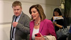 Image: U.S. House Speaker Nancy Pelosi leaves a house democratic leadership