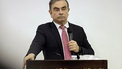 Image: Former Renault-Nissan boss Carlos Ghosn addresses a large crowd of j