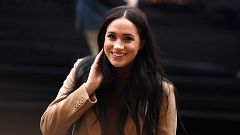 Image: Britain's Meghan, Duchess of Sussex reacts as she arrives to visit C