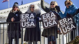 Supporters of the ERA amendment wave at the start of the Virginia General A