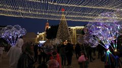 Image: TOPSHOT-PALESTINIAN-RELIGION-CHRISTIANITY-CHRISTMAS