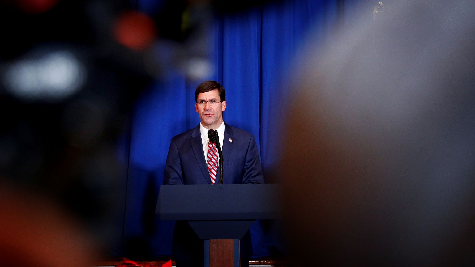 Image: Defense Secretary Mark Esper speaks at a press conference at Mar-a-L