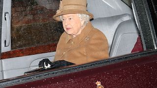 Image: Britain's Queen Elizabeth II departs from church on the Sandringham 