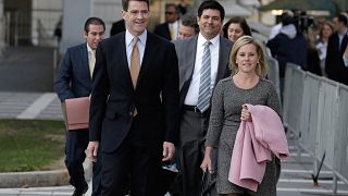 Bill Baroni, left, and Bridget Anne Kelly exit the federal courthouse in Ne