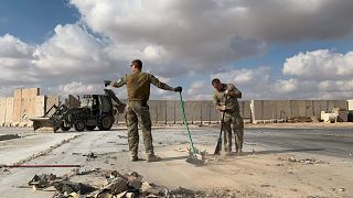 Image: U.S. soldiers clearing rubble at Ain al-Asad military airbase in the