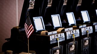 Image: Voting machines at a polling station in Doral, Fla., on Aug. 28, 201